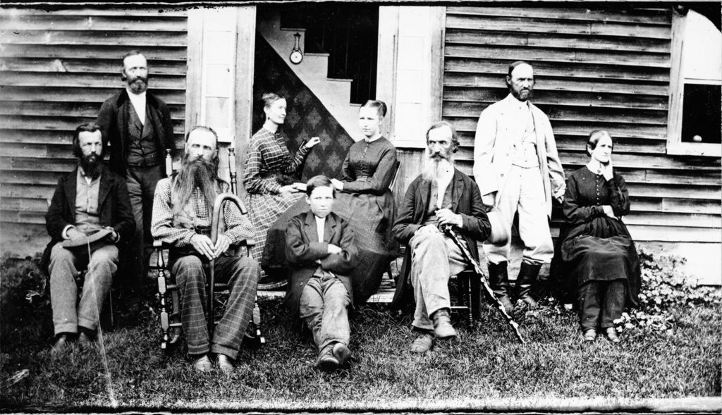 Miniature of Family portrait in front of house