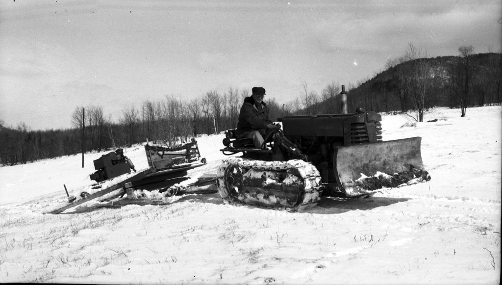 Miniature of Worker on tractor