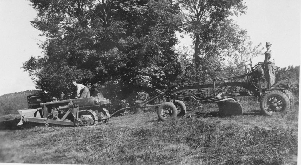 Miniature of Men hauling farm equipment