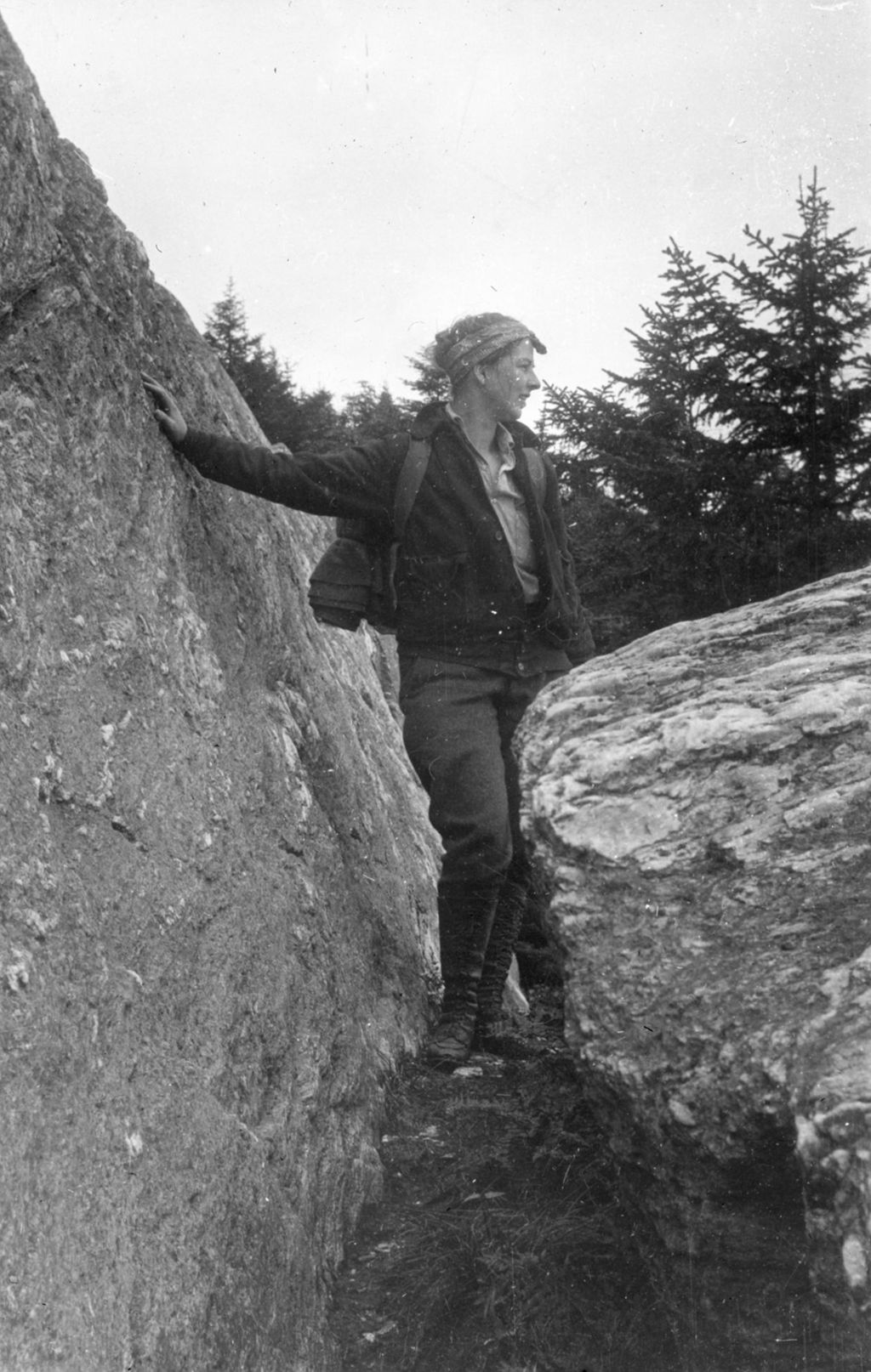 Miniature of Woman looking out from a rock ledge