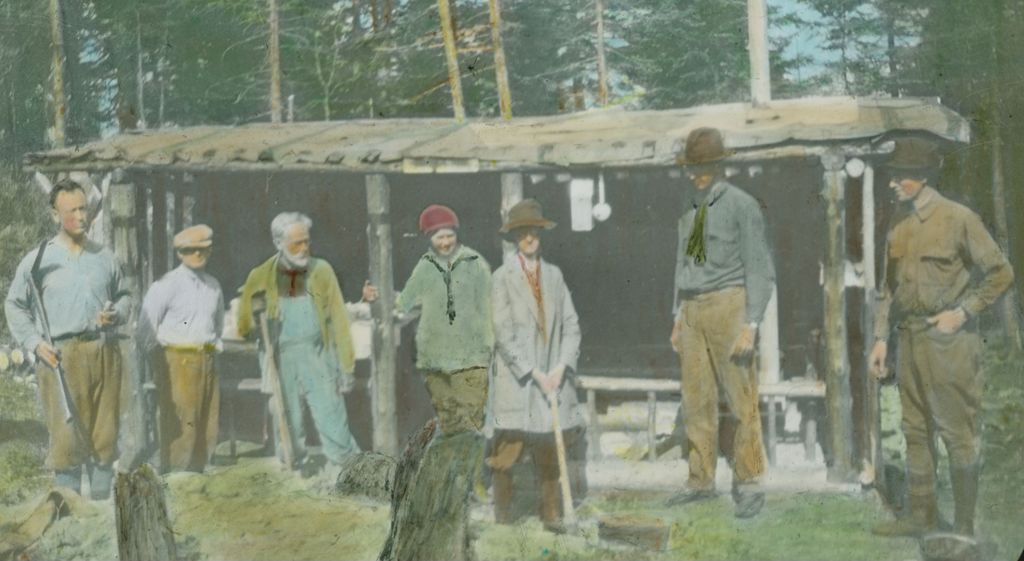 Miniature of Party assembled in front of a shelter