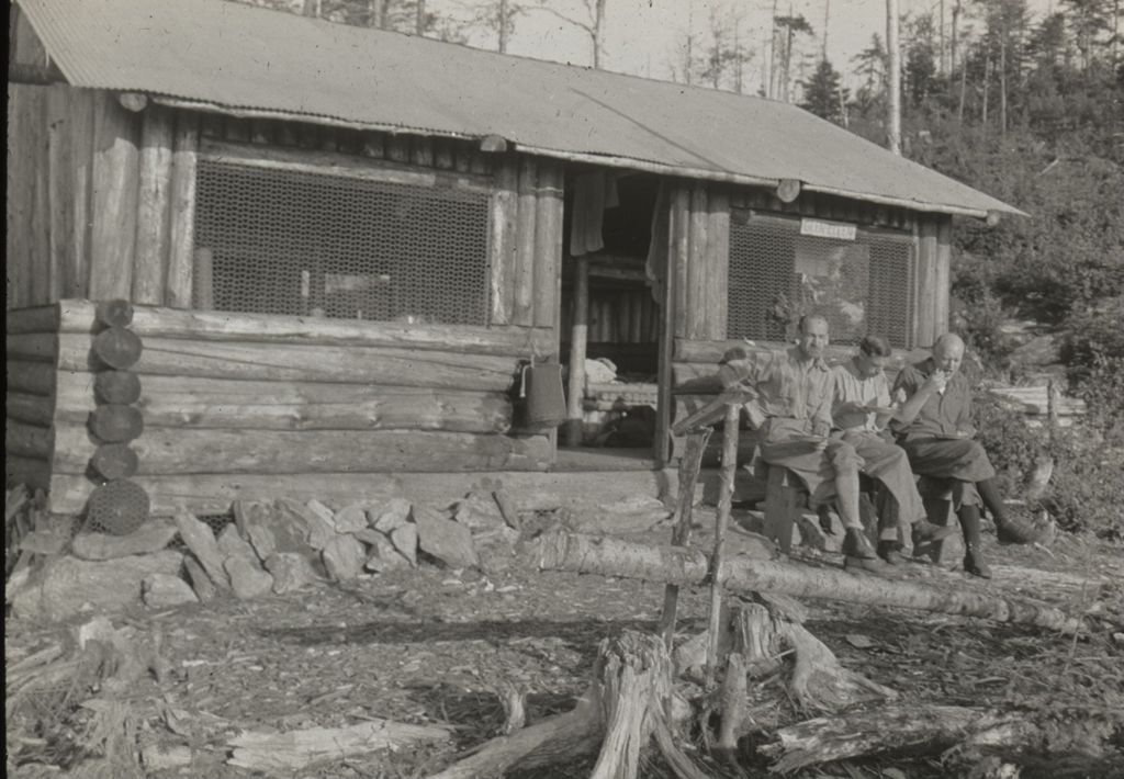 Miniature of Three men eating outside Glen Ellen Lodge