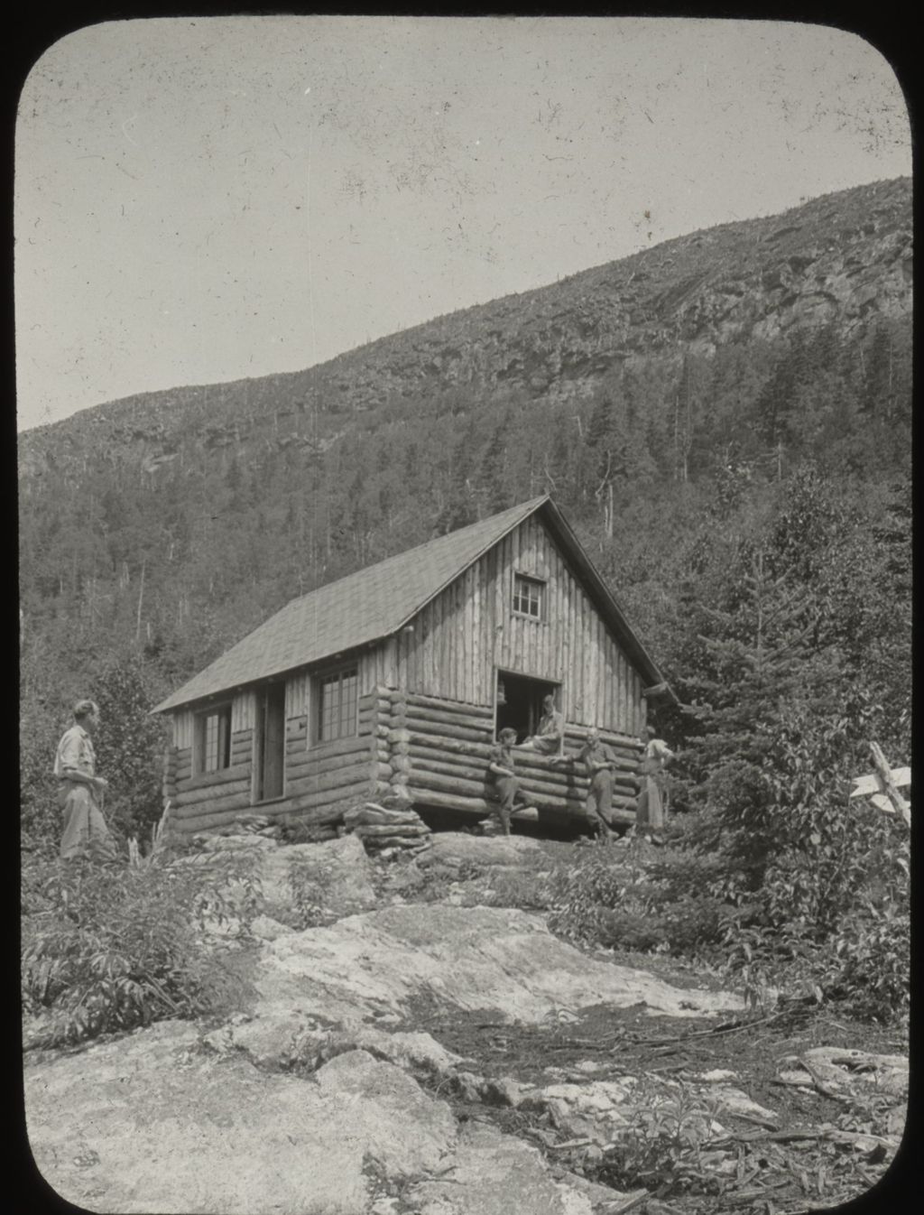 Miniature of Men around a lodge