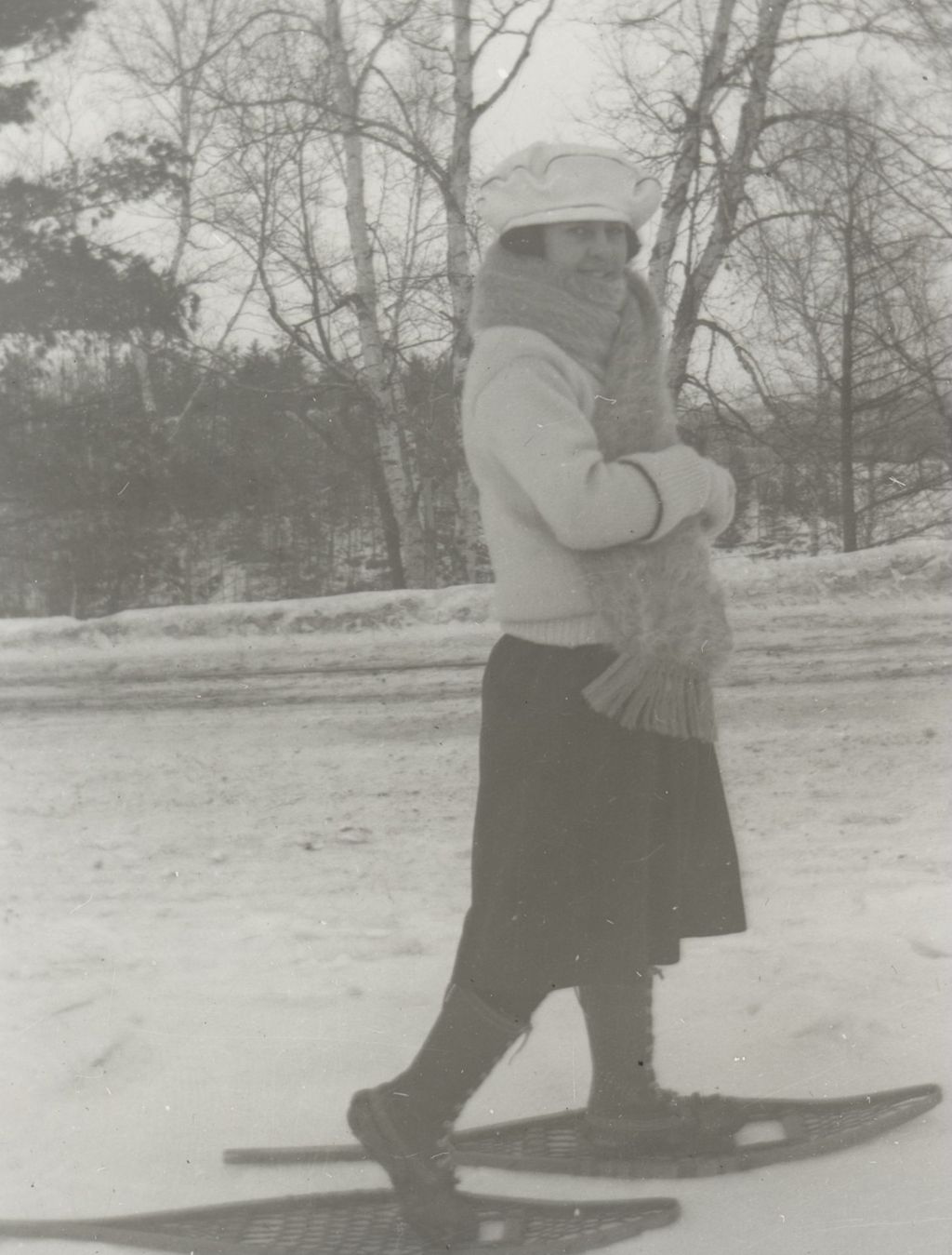 Miniature of Woman on snowshoes