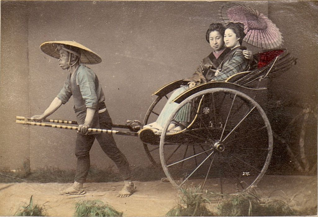 Miniature of Rickshaw driver and two passengers