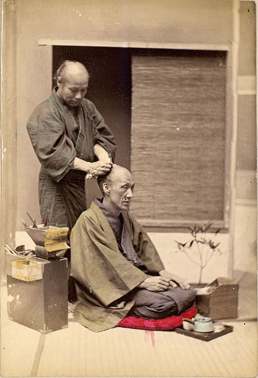 Miniature of An elderly man getting his hair styled