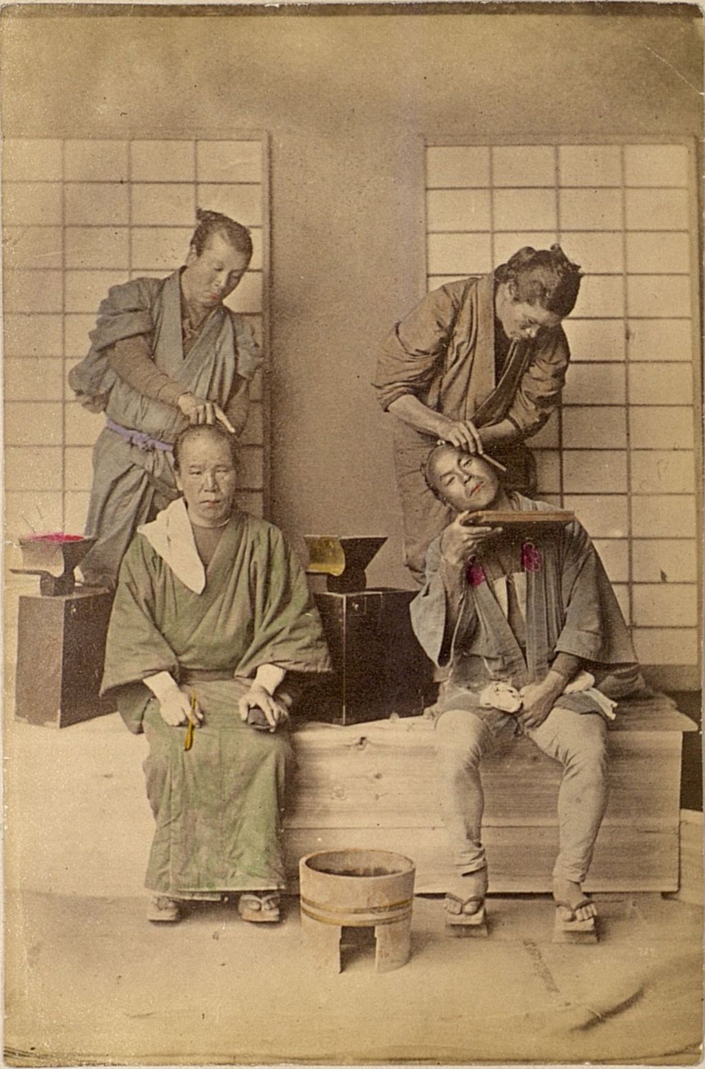 Miniature of Two men getting their hair styled