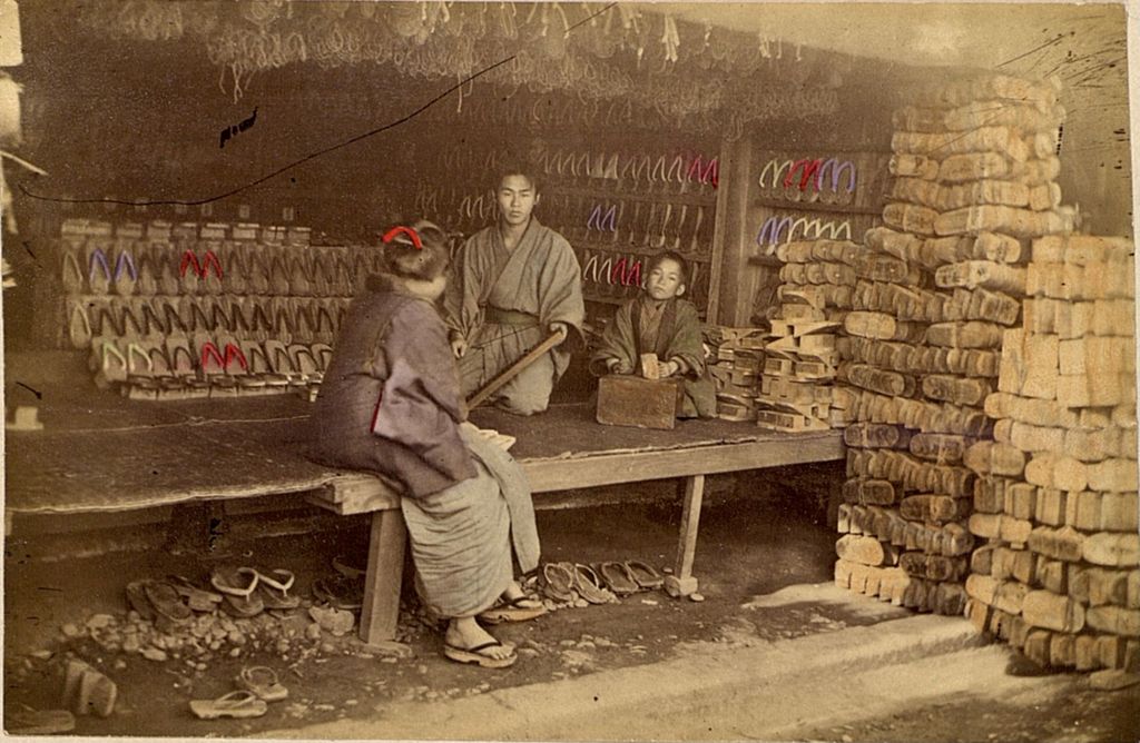 Miniature of Sandal shop owner with a customer