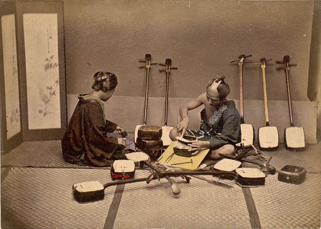 Miniature of Shamisen crafter with a customer