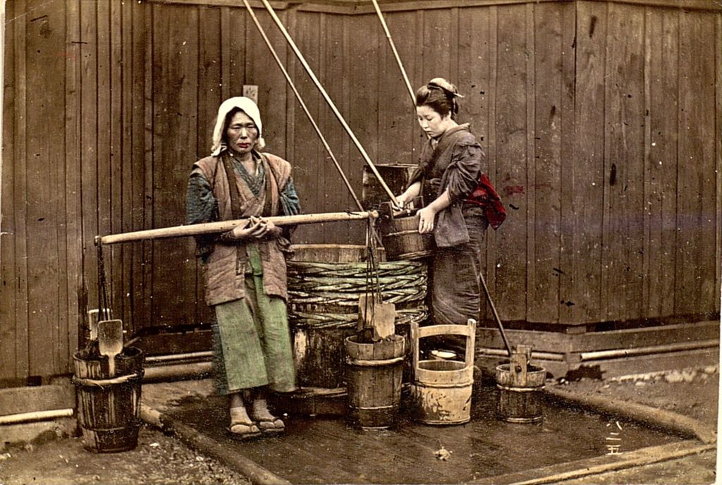 Miniature of Two women getting water at a well