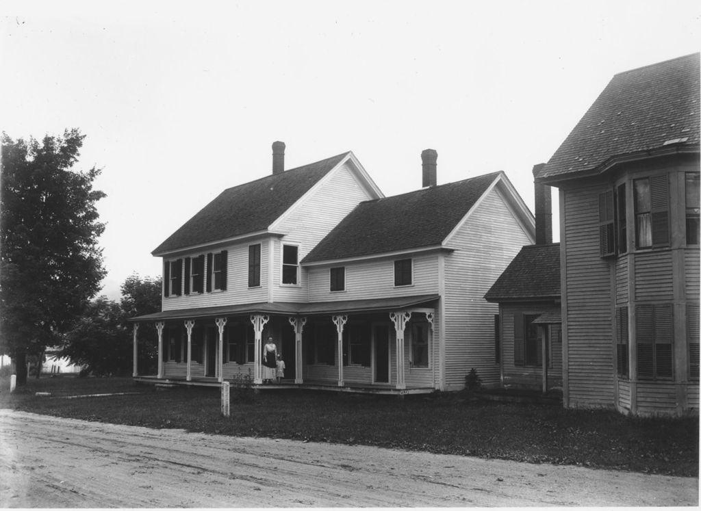 Miniature of Samuel Clark's House with Mrs. Clark and daughter on porch