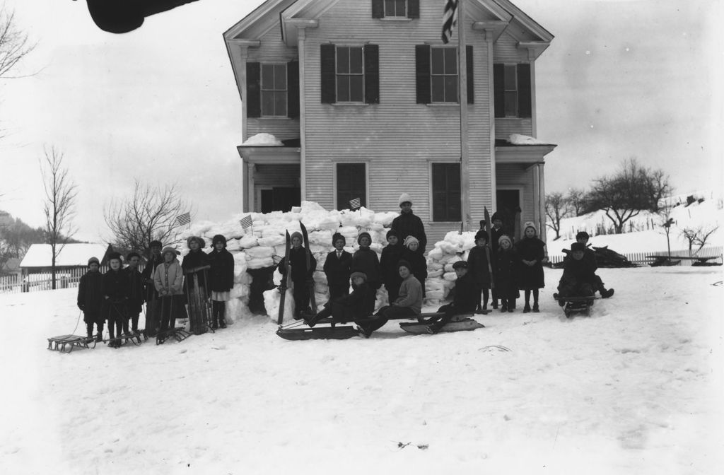 Miniature of Class portrait in front of schoolhouse with sleds, Williamsville, Vt.