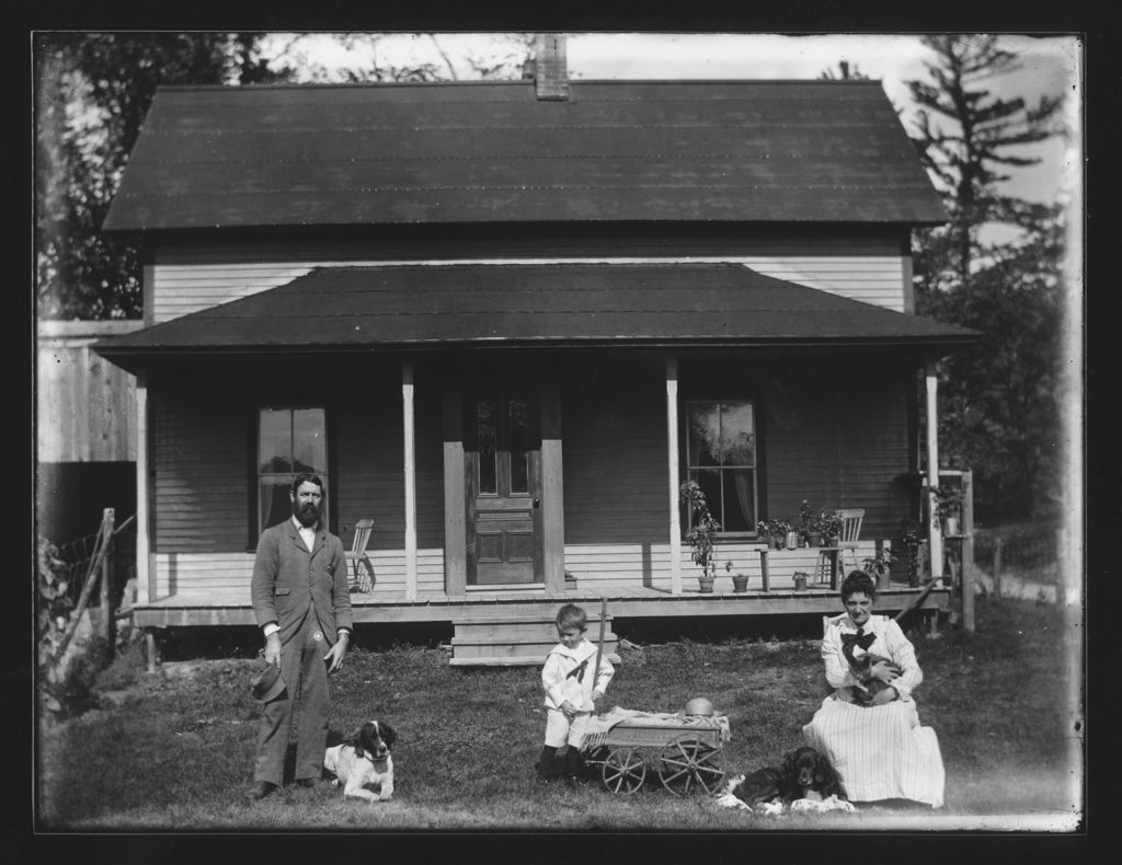 Miniature of Family portrait in front of their dwelling with cat and dogs, Williamsville, Vt.