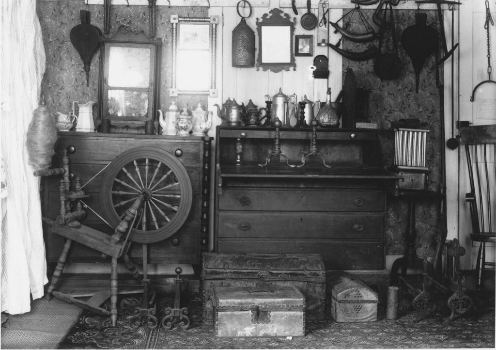 Miniature of M.O. Howe's house interior with spinning wheel and trunks, Newfane, Vt.