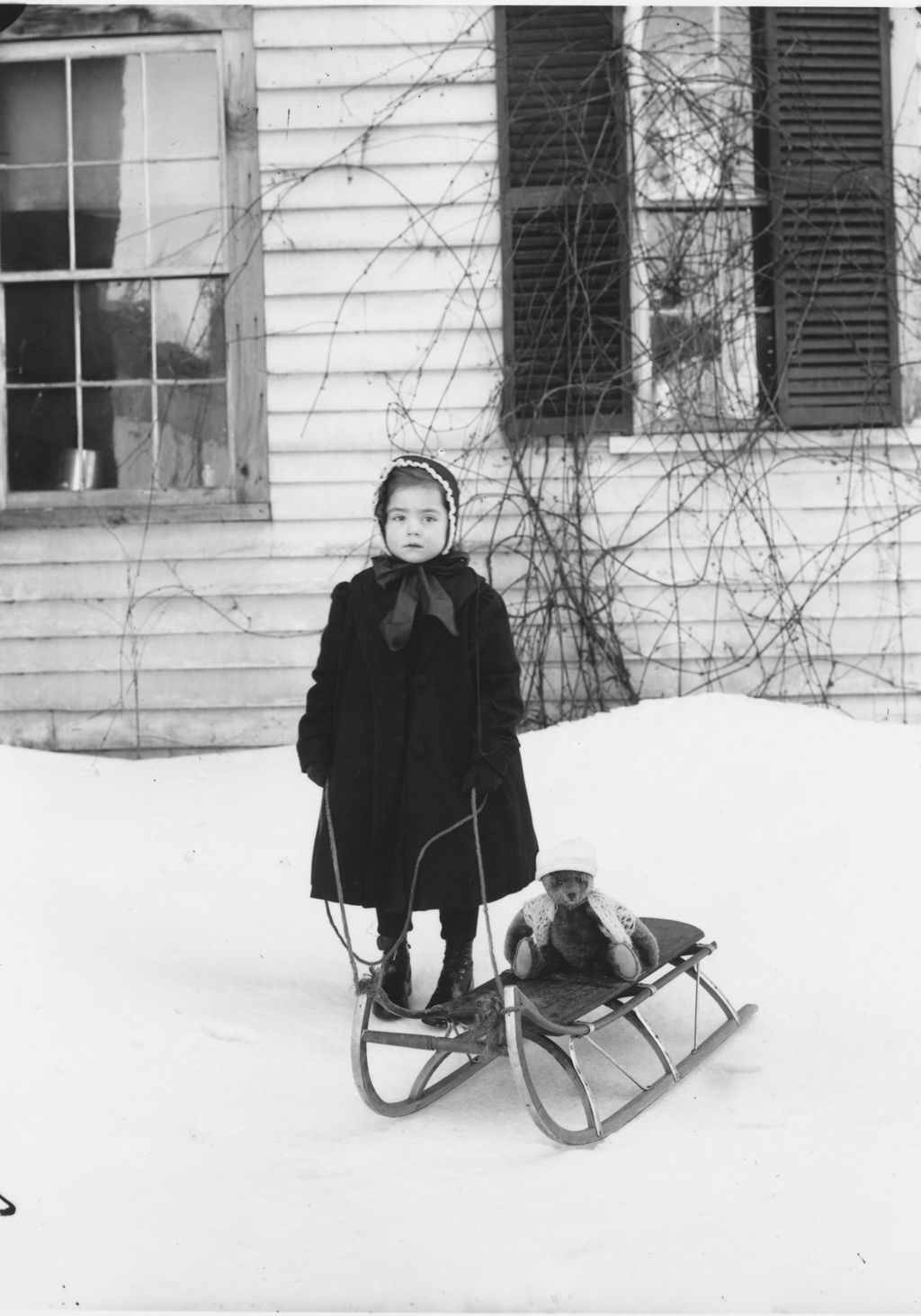 Miniature of Unidentified girl with sled and teddy bear