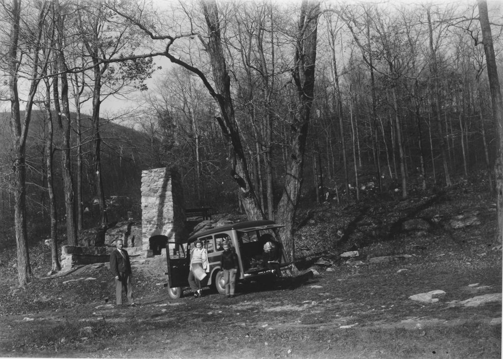 Miniature of Frank Page and Ruth Thayer with children Edward and Page, next to car on a trip