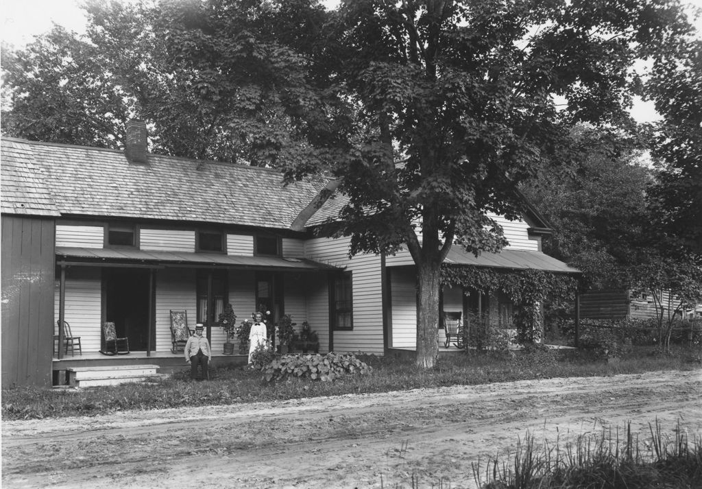 Miniature of Unidentified house with couple in front