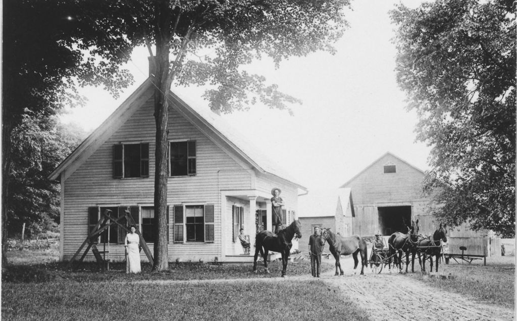 Miniature of Man standing on a horse's back, with other horses and people, in front of farm in Windham County,Vermont