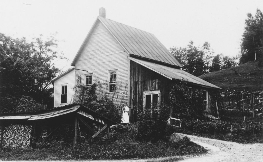 Miniature of Woman with cat, standing in front of the Wardsboro, Vt Creamery